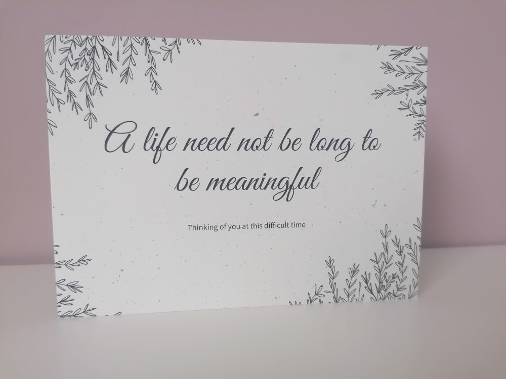Baby loss card, cream background, grey writing, a life need not be long to be meaningful baby loss card